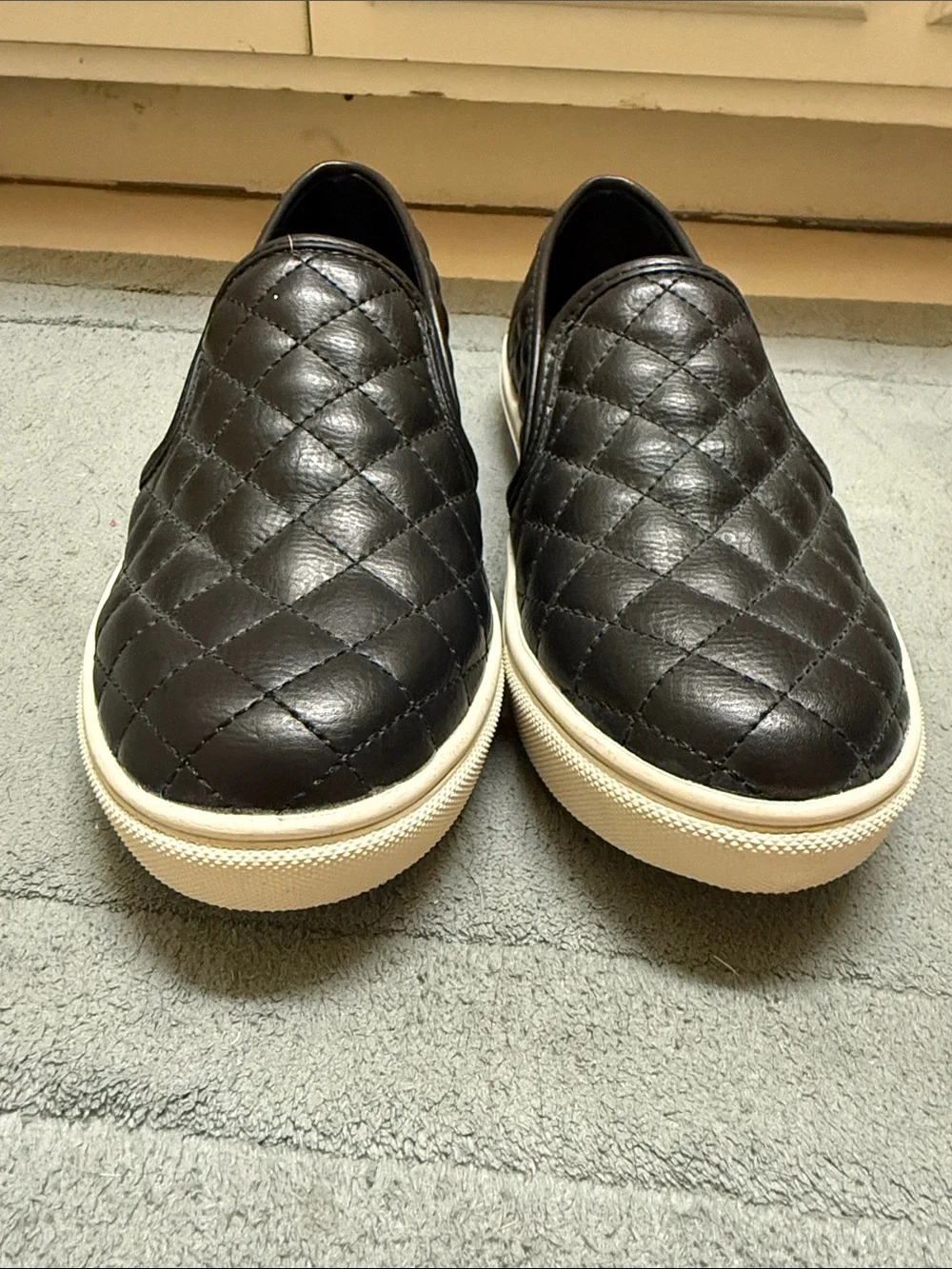 Steve Madden Black Quilted Slip-On Sneakers with White Sole